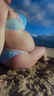 Pregnant belly on the beach 