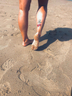 Sexy sandy feet at the beach