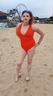 on the beach in swimming costume